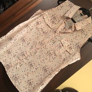 Button down sleeveless blouse. Shirt